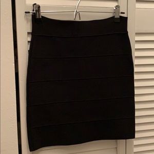 Black bandage “simone” mini skirt